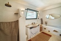 Lamia bathroom with shower and bathtub