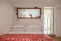 La Casa Delle Luci double bedroom with ensuite bathroom